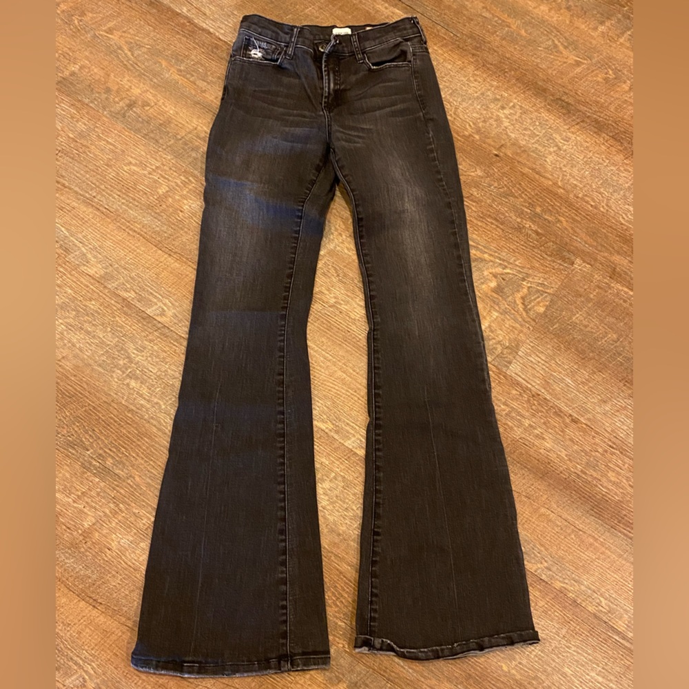 Sneak Peek black flare jeans.